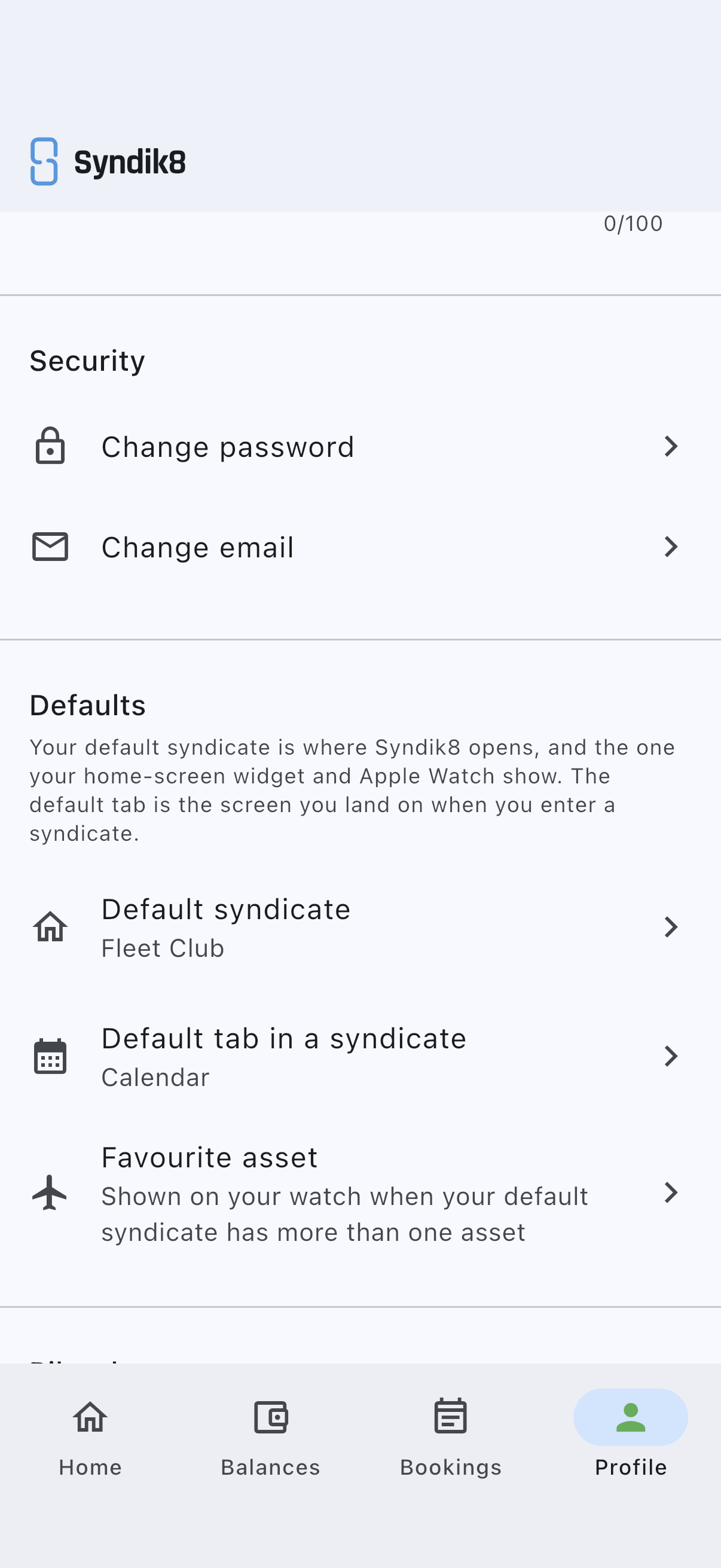 The Defaults card with the Favourite asset row at its foot, its subtitle reading that the choice is shown on your watch when your default syndicate has more than one asset