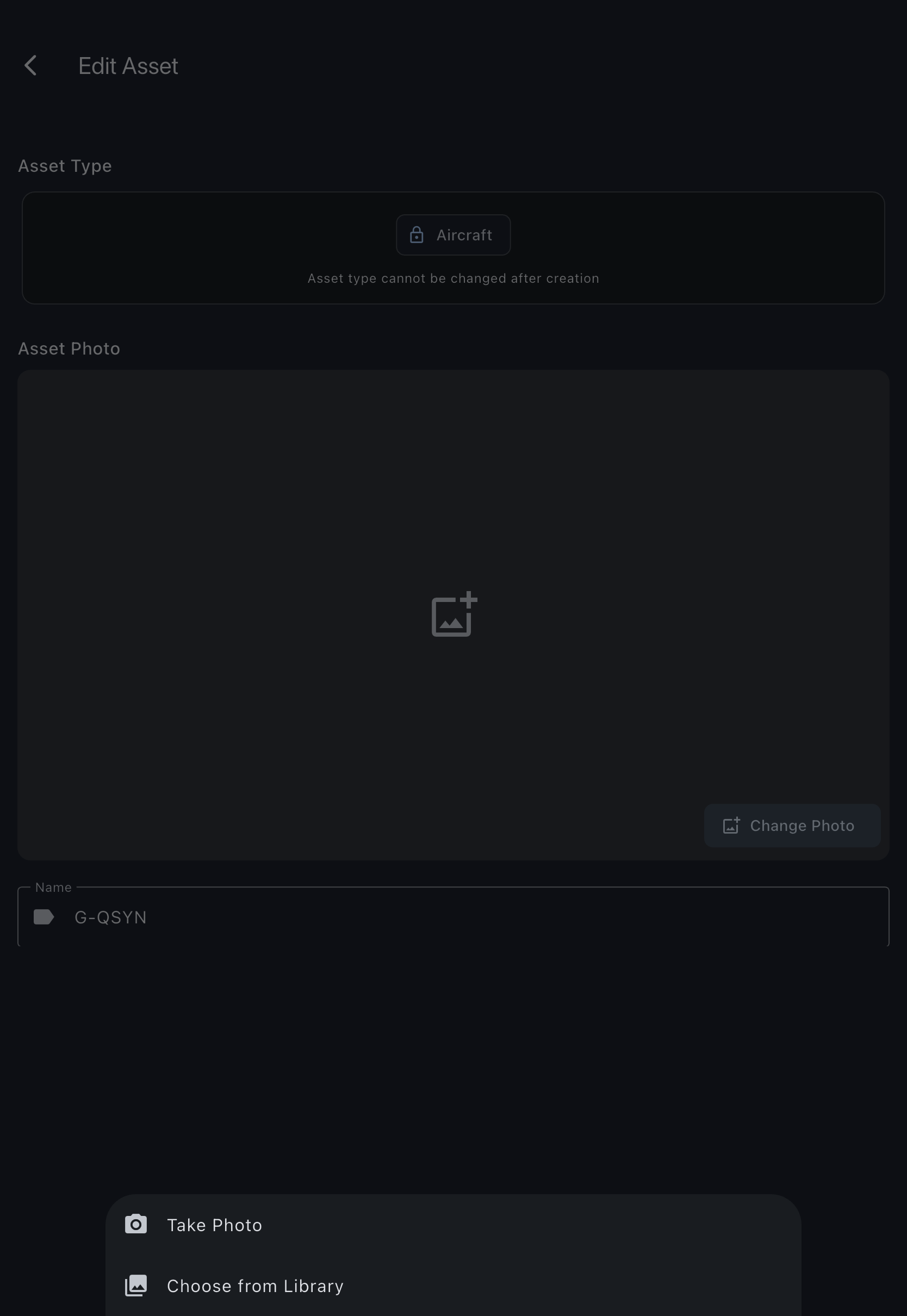The Edit Asset screen with the Asset Photo section near the top, its Change Photo button, and the source picker offering the camera or the photo library